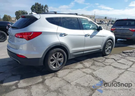 2014 Hyundai Santa Fe Sport 2.4L z USA, uszkodzony, nr VIN 5XYZU3LB7EG205102